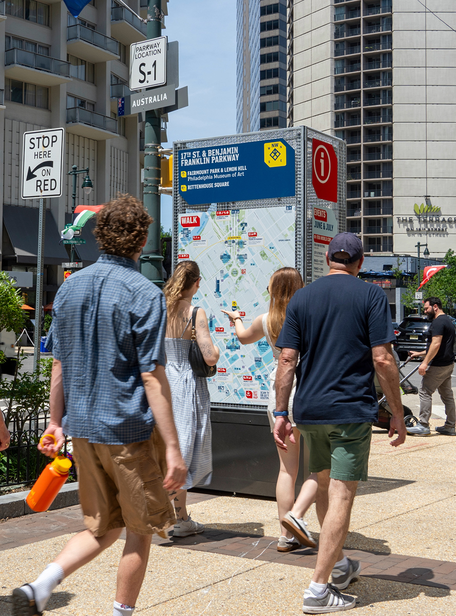 Walk Philadelphia map with people looking for directions.
