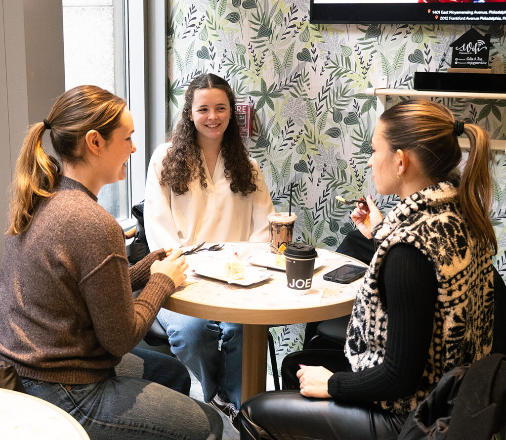 Photo of Cake and Joe interior with people eating and drinking