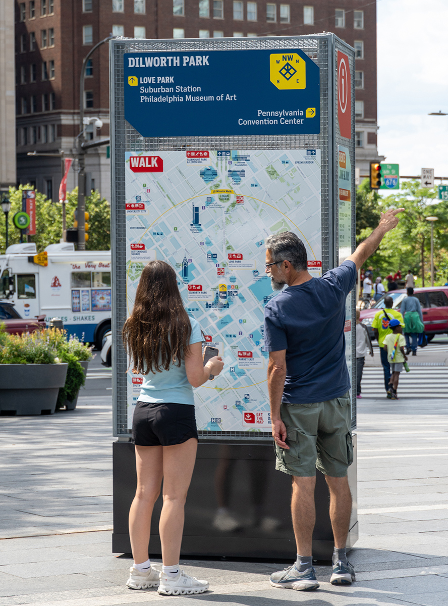 Walk Philadelphia map with people looking for directions.