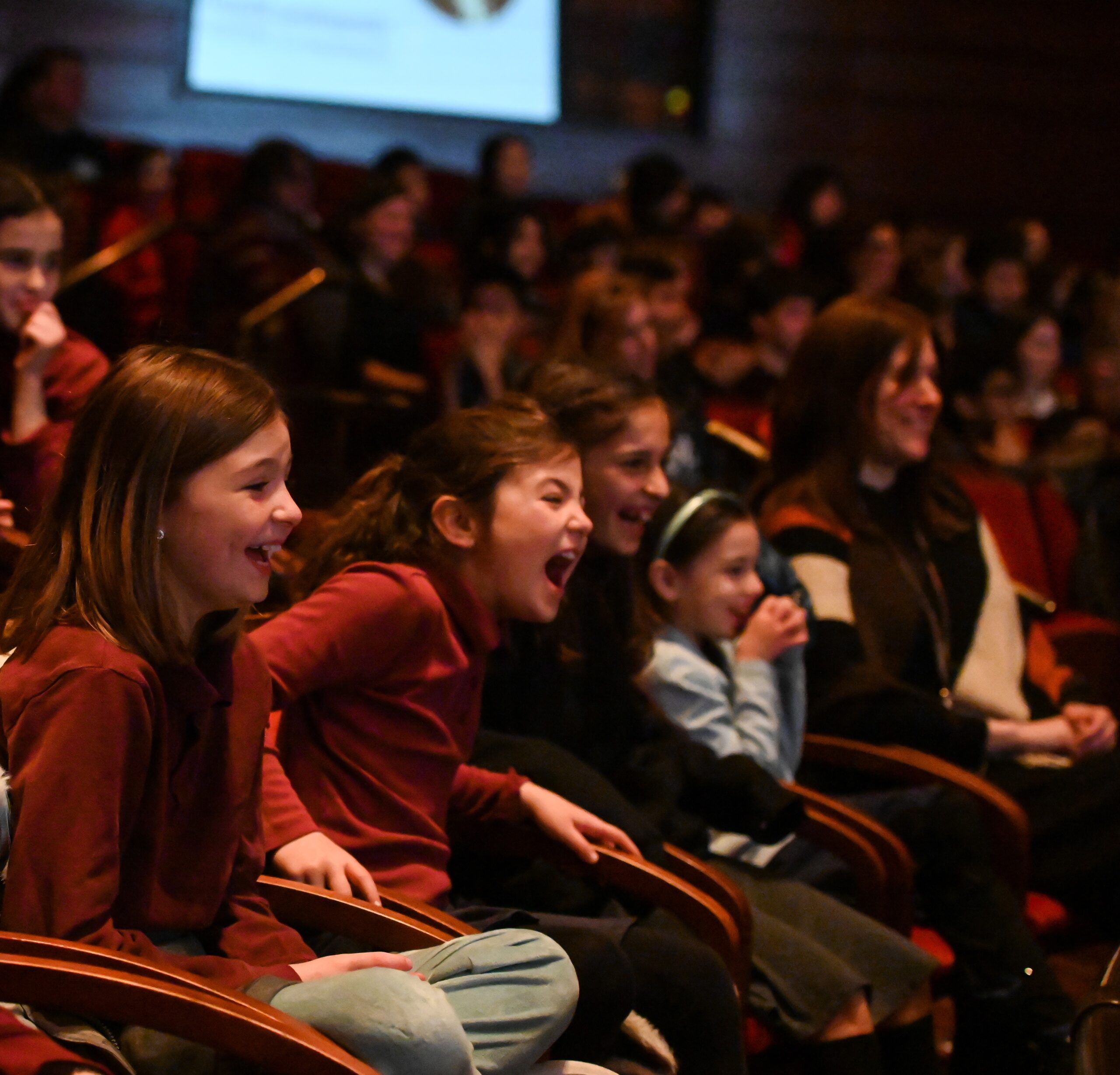kids enjoying a Philadelphia orchestra show