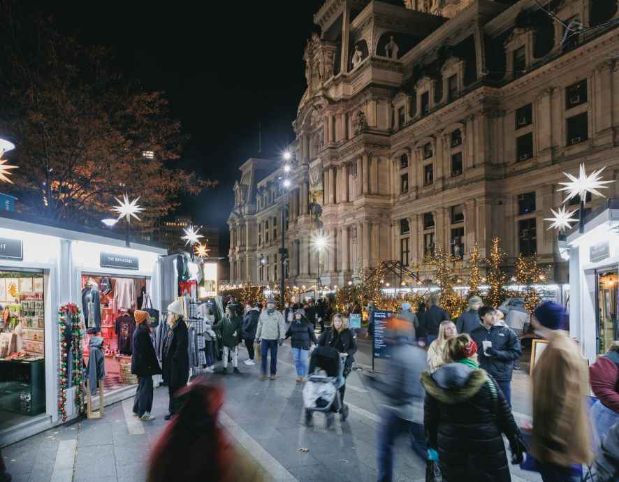 People shopping at Philadelphia holiday market.