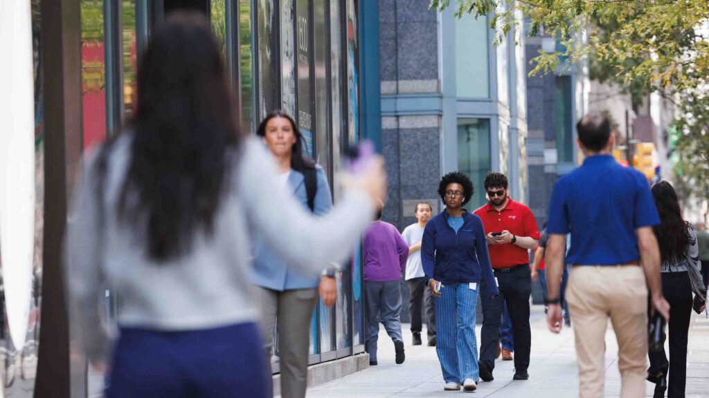 Young professionals walking in the office sector
